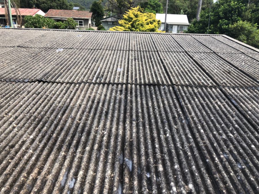 Asbestos sheeting about to be safely removed by in partial demolition on the Central Coast by demolition and asbestos removal contractor