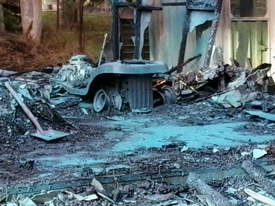 Fire damaged site spray sealed for safe asbestos abatement